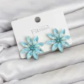 BUĞZ Buz Mavisi Renk Kristal Taşlı Lotus Çiçek Model Kadın Küpe