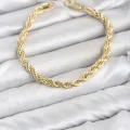BUĞZ CM Burgu Model Gold Renk Pirinç Kadın Bileklik