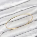 BUĞZ CM Gold Renk Simli Model 65 mm Bilezik