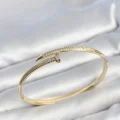 BUĞZ Gold Renk Çivi Model Zirkon Taşlı Kadın Kelepçe Bileklik