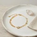 BUĞZ Gold Renk Pirinç Ataç ve Puntalı Zincirli Yıldız Model Kadın Bileklik