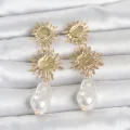 BUĞZ Gold Renk Pirinç Güneş Model Detaylı Kadın Küpe
