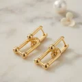 BUĞZ Gold Renk Pirinç Tifani Model Kadın Küpe
