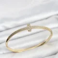 BUĞZ Gold Renk T Model Zirkon Taşlı Kadın Kelepçe Bileklik