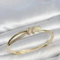 BUĞZ Gold Renk Zirkon Taşlı Düğüm Model Kadın Kelepçe Kadın Bileklik