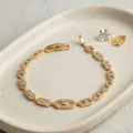 BUĞZ Gold Renk Zirkon Taşlı Messika Model Bileklik