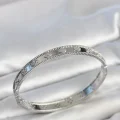 BUĞZ Gümüş Renk Pirinç Yonca Model Zirkon Taşlı Kadın Kelepçe Bileklik