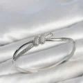 BUĞZ Gümüş Renk Zirkon Taşlı Düğüm Model Kadın Kelepçe Kadın Bileklik