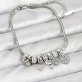 BUĞZ Kelebek Charmlı Gümüş Renk Kadın Bileklik