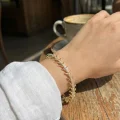 BUĞZ Pirinç Gold Renk Balık Sırtı Model Zirkon Taşlı Kadın Bileklik - BUĞZ