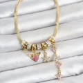 BUĞZ Pirinç Gold Renk Kalp ve Çiçek Detaylı Charmlı Kadın Bileklik
