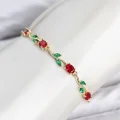 BUĞZ Pirinç Gold Renk Kırmızı Zirkon Taşlı Çiçek Model Kadın Bileklik