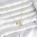 BUĞZ Pirinç Gold Renk Minimal Yıldız Model Kadın Kolye