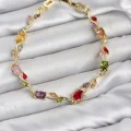 BUĞZ Pirinç Gold Renk Mix Renk Zirkon Taşlı Çiçek Model Kadın Bileklik