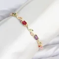BUĞZ Pirinç Gold Renk Mix Renk Zirkon Taşlı Çiçek Model Kadın Bileklik