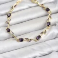 BUĞZ Pirinç Gold Renk Mor Zirkon Taşlı Çiçek Model Kadın Bileklik
