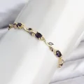 BUĞZ Pirinç Gold Renk Mor Zirkon Taşlı Çiçek Model Kadın Bileklik