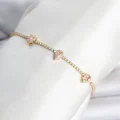 BUĞZ Pirinç Gold Renk Pembe Damla Taş Detaylı Kadın Su Yolu Bileklik