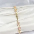 BUĞZ Pirinç Gold Renk Pembe Zirkon Taşlı Çiçek Model Kadın Bileklik