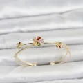 BUĞZ Pirinç Gold Renk Renkli Çiçek Model Kadın Bileklik
