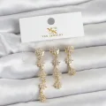 BUĞZ Pirinç Gold Renk Sıralı Kutup Yıldızı Model 3lü Kadın Küpe
