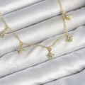 BUĞZ Pirinç Gold Renk Sıralı Minimal Kutup Yıldızı Model Kadın Kolye
