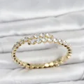 BUĞZ Pirinç Gold Renk Sıralı Zirkon Taşlı Kadın Bileklik