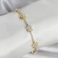 BUĞZ Pirinç Gold Renk Yıldız Model Zirkon Taşlı Kadın Bileklik