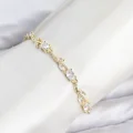 BUĞZ Pirinç Gold Renk Zirkon Taşlı Çiçek Model Kadın Bileklik