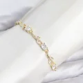 BUĞZ Pirinç Gold Renk Zirkon Taşlı Çiçek Model Kadın Bileklik - BUĞZ