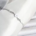 BUĞZ Pirinç Gümüş Renk Çiçek Model Su Yolu Kadın Bileklik