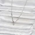 BUĞZ Pirinç Gümüş Renk Damla Model Kadın Kolye