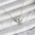 BUĞZ Pirinç Gümüş Renk Minimal Yıldız Model Kadın Kolye
