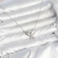 BUĞZ Pirinç Gümüş Renk Minimal Yıldız Model Kadın Kolye