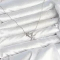 BUĞZ Pirinç Gümüş Renk Minimal Yıldız Model Kadın Kolye - BUĞZ