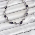 BUĞZ Pirinç Gümüş Renk Mor Zirkon Taşlı Çiçek Model Kadın Bileklik
