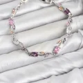 BUĞZ Pirinç Gümüş Renk Pembe ve Mor Zirkon Taşlı Çiçek Model Kadın Bileklik