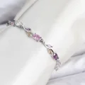 BUĞZ Pirinç Gümüş Renk Pembe ve Mor Zirkon Taşlı Çiçek Model Kadın Bileklik