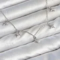 BUĞZ Pirinç Gümüş Renk Sıralı Minimal Kutup Yıldızı Model Kadın Kolye