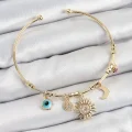 BUĞZ Pirinç Zirkon Taşlı Güneş Ay Nazar Model Gold Renk Charm Bileklik