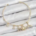 BUĞZ Pirinç Zirkon Taşlı İstiridye Ve Deniz Yıldızı Model Gold Renk Charm Bileklik
