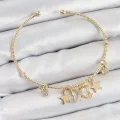 BUĞZ Pirinç Zirkon Taşlı Kelebek Ve Yıldız Model Gold Renk Charm Bileklik