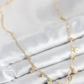 BUĞZ Pirinç Zirkon Taşlı Sallantılı Damla Model Gold Renk Kadın Kolye - BUĞZ