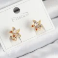BUĞZ Pirinç Zirkon Taşlı Yıldız Model Gold Renk Çocuk Küpe