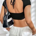 Kadın Siyah Sırt Dekolteli ve Boyundan Bağlamalı Yarım Kol Crop Top Bluz