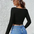 Kadın Siyah Uzun Kollu Agraflı Göğüs ve Göbek Dekolteli Crop Top Bluz