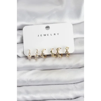 BUĞZ Gold Renk Pirinç Yıldız Modelli Kadın Küpe Seti