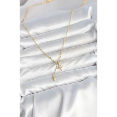 BUĞZ Pirinç Gold Renk Zirkon Taşlı Minimal Sallantılı Kutup Yıldızı Model Kadın Kolye - BUĞZ