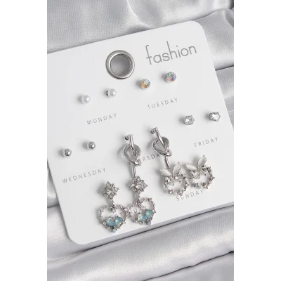 BUĞZ Pirinç Gümüş Renk Sallantı Zirkon Taşlı Kalp Model Düğüm Detay 7 Çift Kadın Küpe Seti