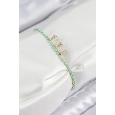 BUĞZ Pirinç Zirkon Taşlı Mavi Boncuklu Model Gold Renk Kadın Bileklik